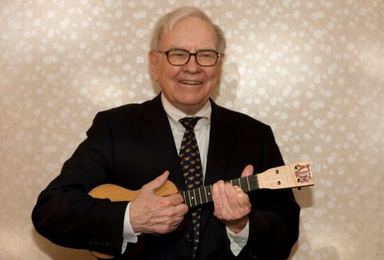 Warren Buffet playing guitar